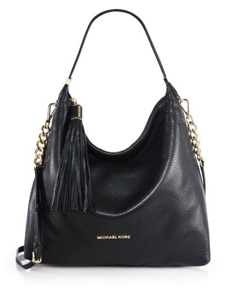 how much is a black michael kors purse|michael kors black ribbed purses.